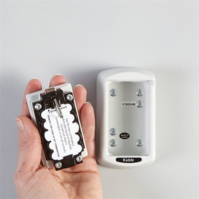 Wall-mounted locking key storage box with push-button combination and backup keys