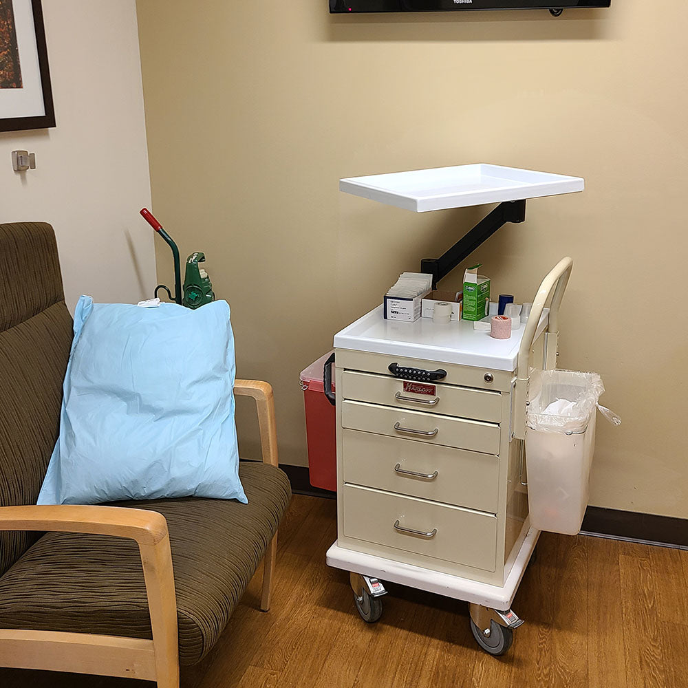 IV Start Cart in use during IV or epidural procedure with sharps disposal system