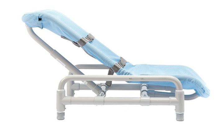 Child seated in Contour Supreme Bath Chair with PVC base