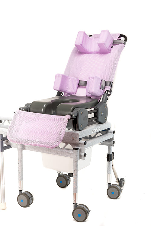 Bath chair showing lateral supports and headrest accessory