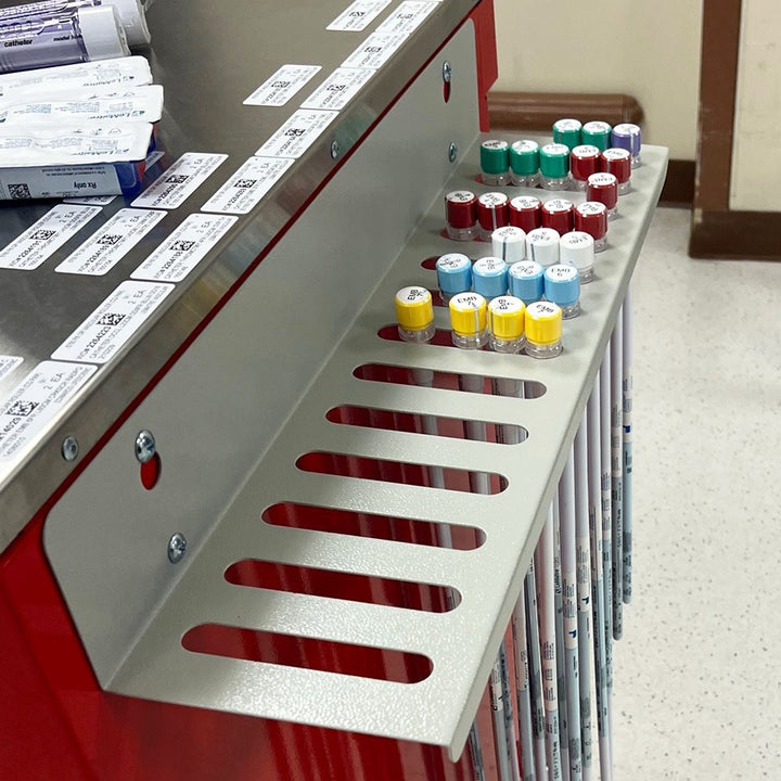 MS?CATHSIDEHLDR in?use view on cabinet with tray accessories