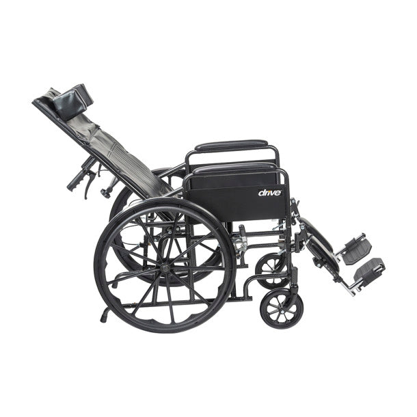 Silver Sport Recliner wheelchair with vinyl upholstery, shown in upright position with padded armrests and carbon steel frame