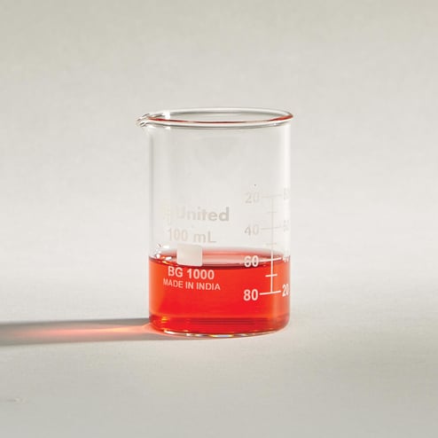Glass beaker 100mL showing graduated scale and easy-pour spout