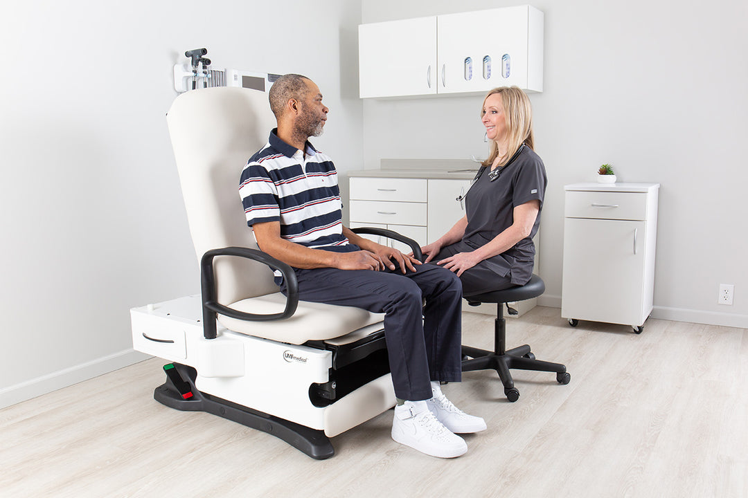 4040 Series examination table showcasing hand control and seamless adjustments – comfort-focused
