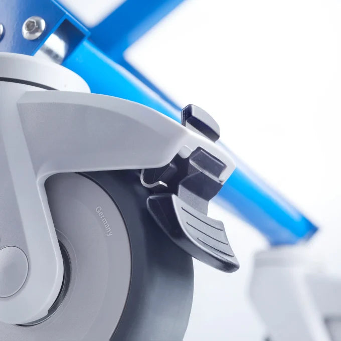 Airchair II castor brake mechanism for controlled passenger movement