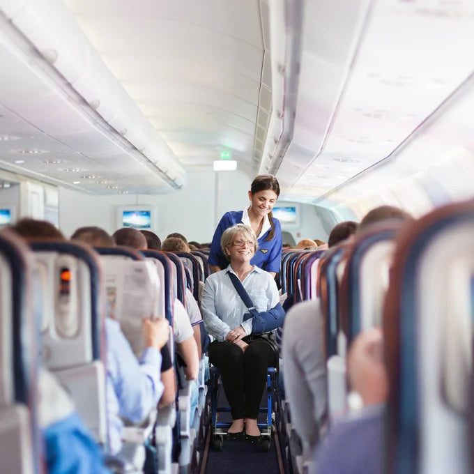 Airchair II portable aircraft boarding chair shown in use for passenger assistance