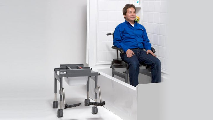 Side view of Versa Transfer system setup over bathtub