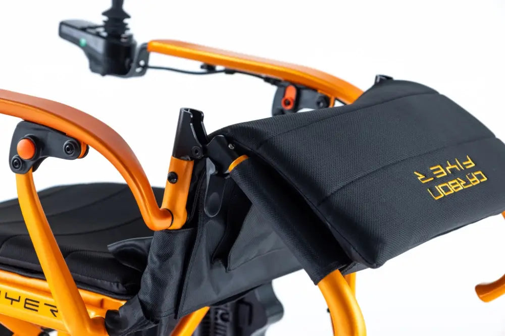 Carbon Flyer ultra lightweight electric wheelchair outdoors