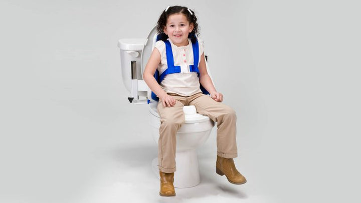 Padded toilet reducer ring with built-in splash guard