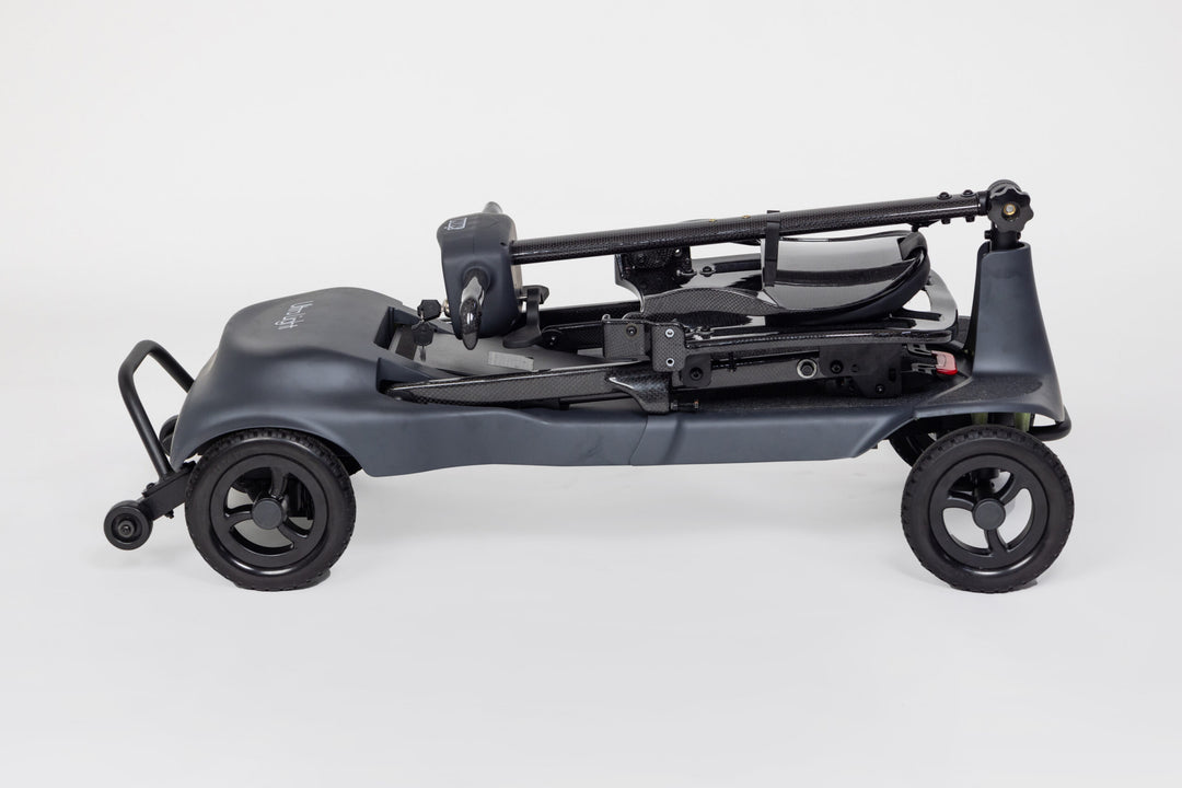 Genie Ultralight portable folding scooter indoors