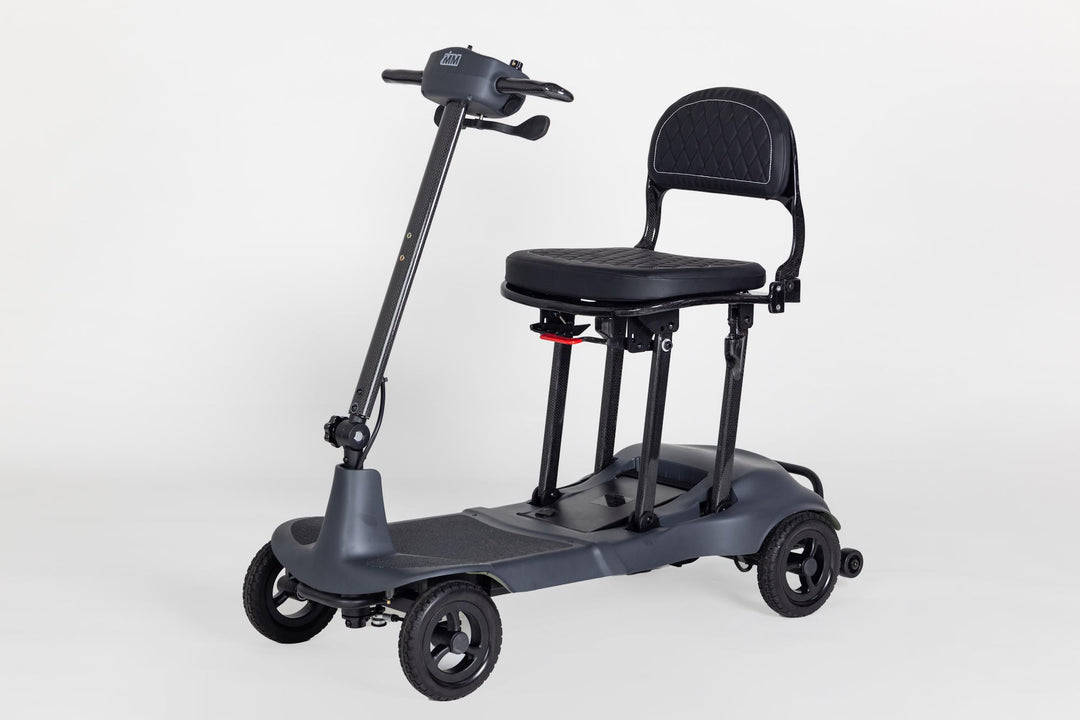 Genie Ultralight mobility scooter side profile outdoors