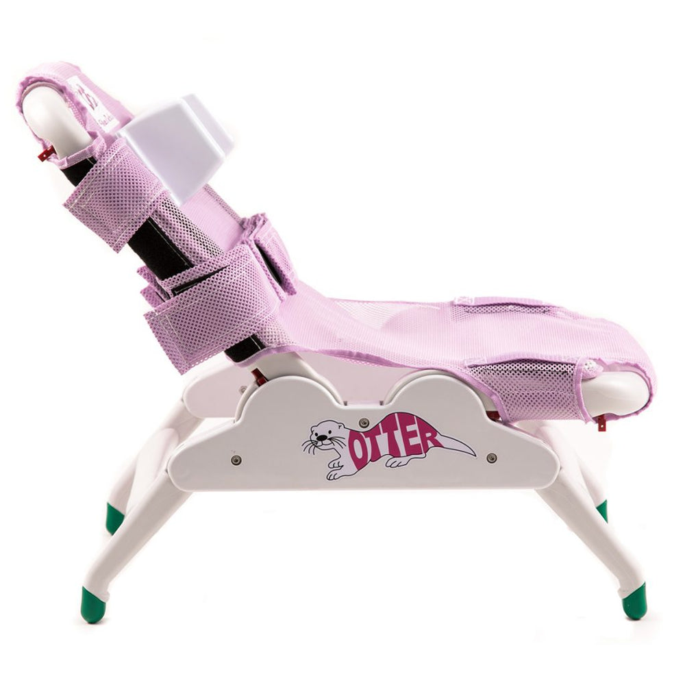 Child bathing safely in the Otter Pediatric Chair – Seahorse Green fabric