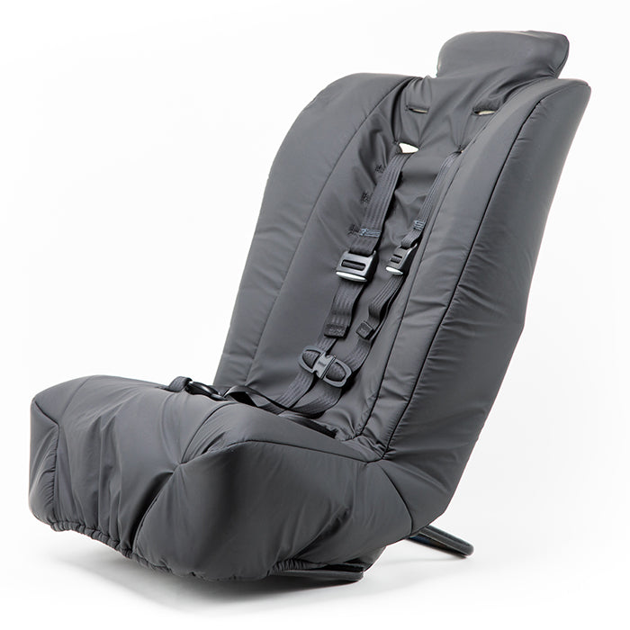 Close-up of the Spirit Spica car seat cushion with visible memory-foam layers under the removable black cover.