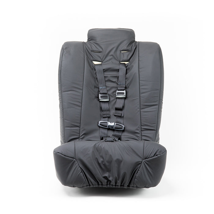 Two black foam positioning wedges that come with the Spirit Spica car seat, shown on a white background. 