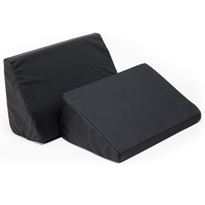 Stealth Black Spirit Spica car seat with wipe-clean padded fabric and adjustable harness, angled front-side view.