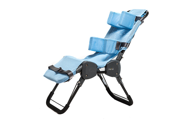 Child seated in Ultima Bath Chair with back and leg support