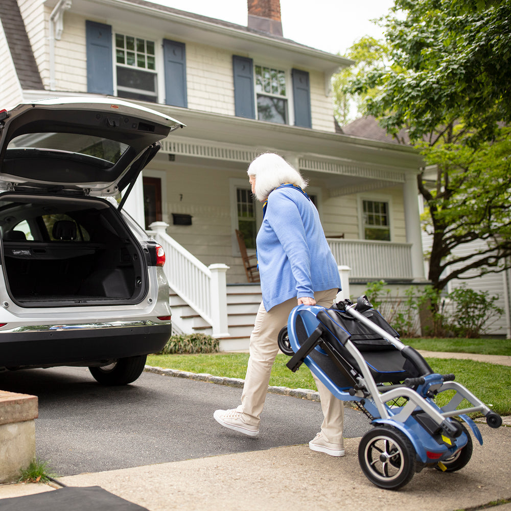 Journey So Lite scooter loading into car trunk