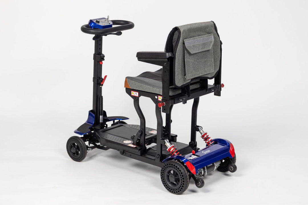 Genie lightweight travel mobility scooter outdoors