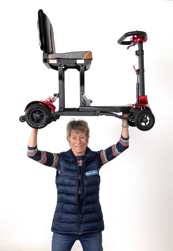 Genie folding travel mobility scooter compact design