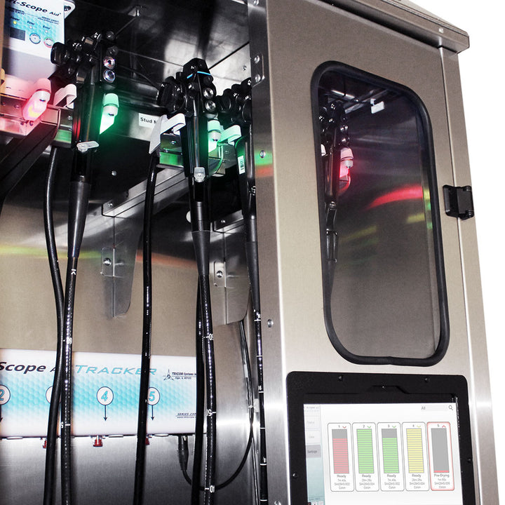 Interior view of endoscope cabinet with scope LED indicators lit