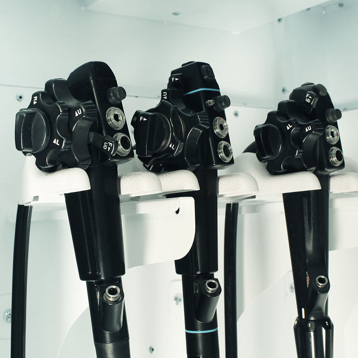 Close-up of scope mounts inside SureDry Pass-Through Cabinet