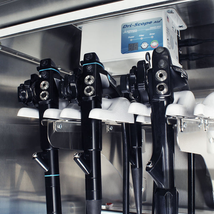 Closeup of stainless Dri-Scope Aid endoscope holder inside SureDry cabinet