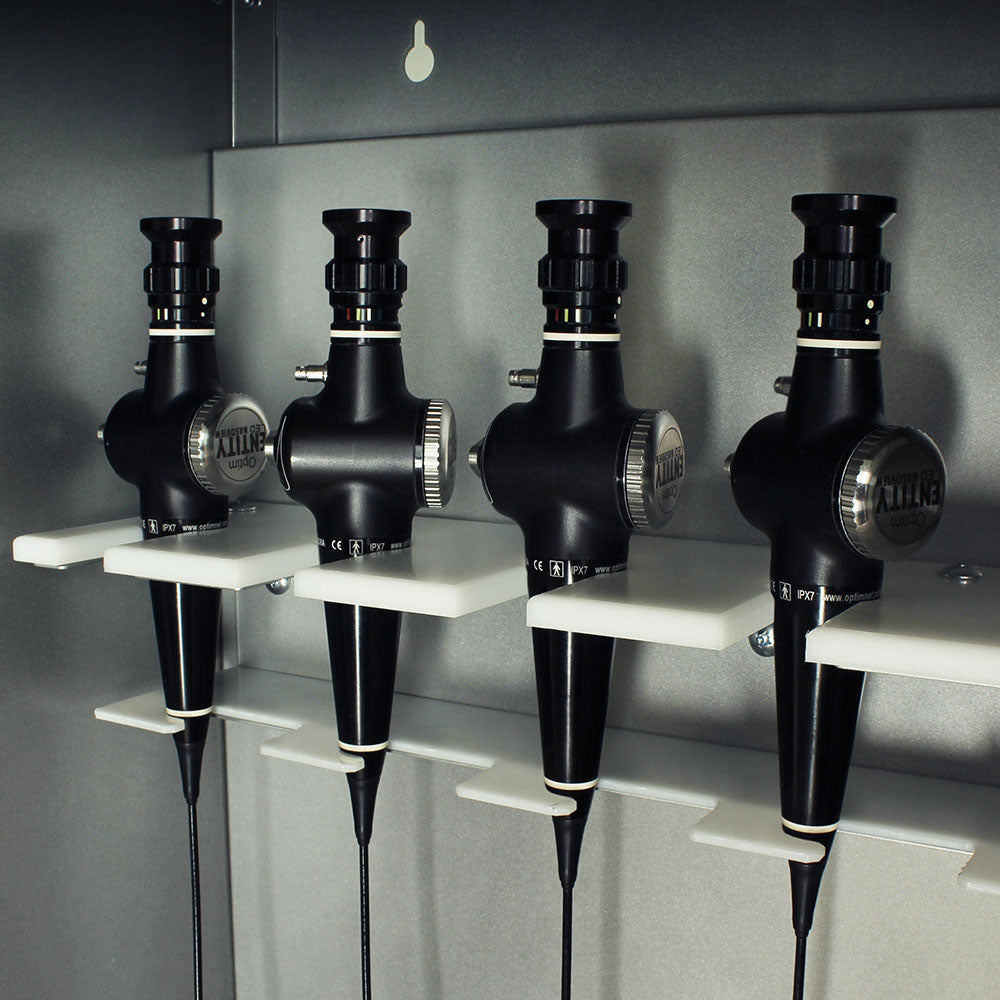Close-up of scope holders inside ENT drying cabinet