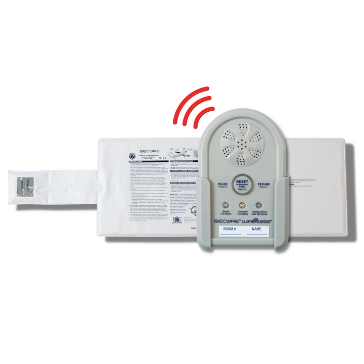 Wireless bed set including alarm transmitter and pad